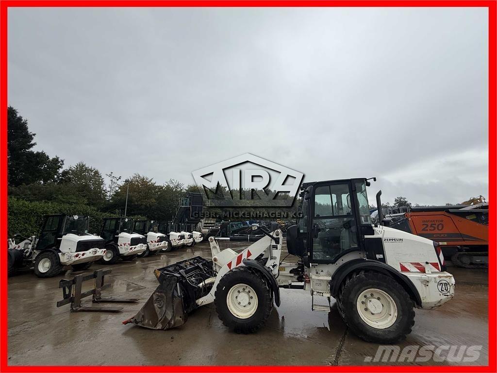 CAT 908M Iekrāvēji uz riteņiem