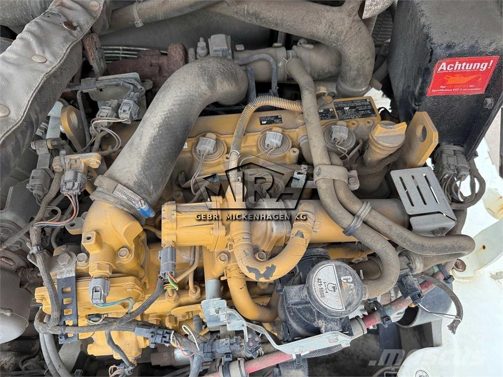 CAT 908M Iekrāvēji uz riteņiem