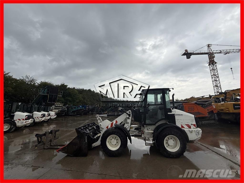 CAT 908M Iekrāvēji uz riteņiem