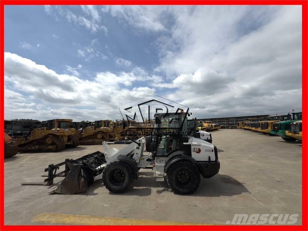 CAT 908M Iekrāvēji uz riteņiem