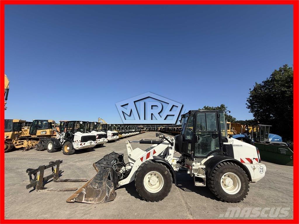 CAT 908M Iekrāvēji uz riteņiem