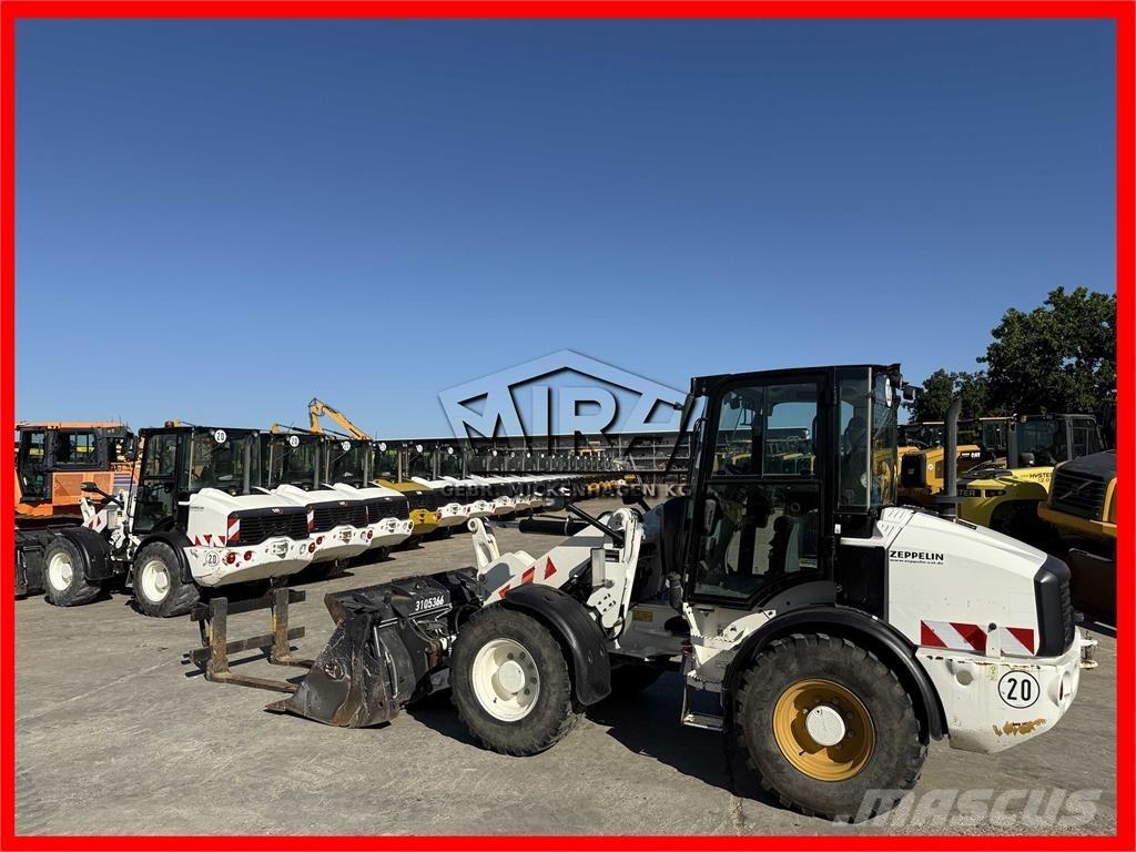 CAT 908M Iekrāvēji uz riteņiem