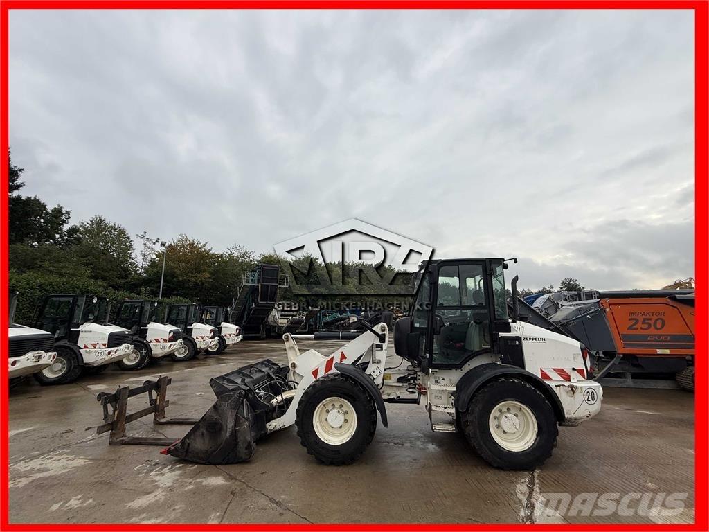 CAT 908M Iekrāvēji uz riteņiem