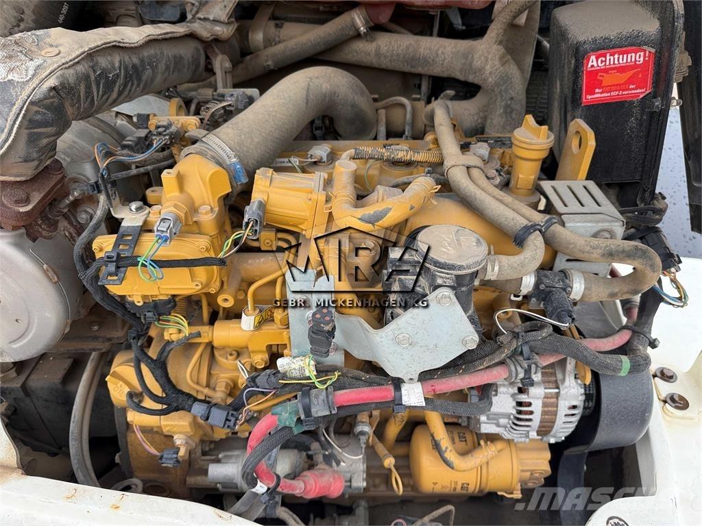CAT 908M Iekrāvēji uz riteņiem