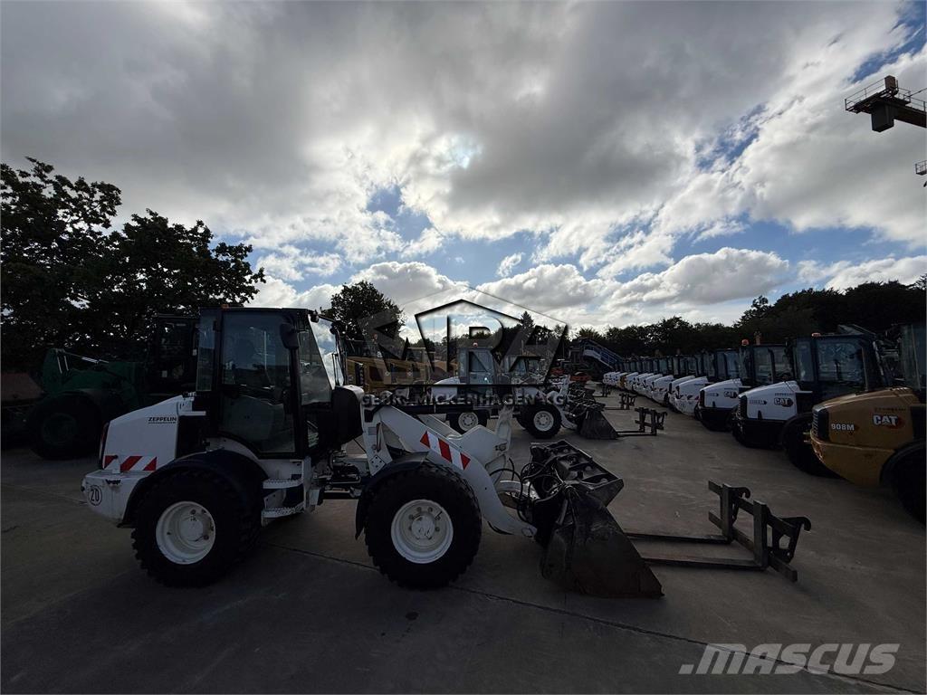 CAT 908M Iekrāvēji uz riteņiem