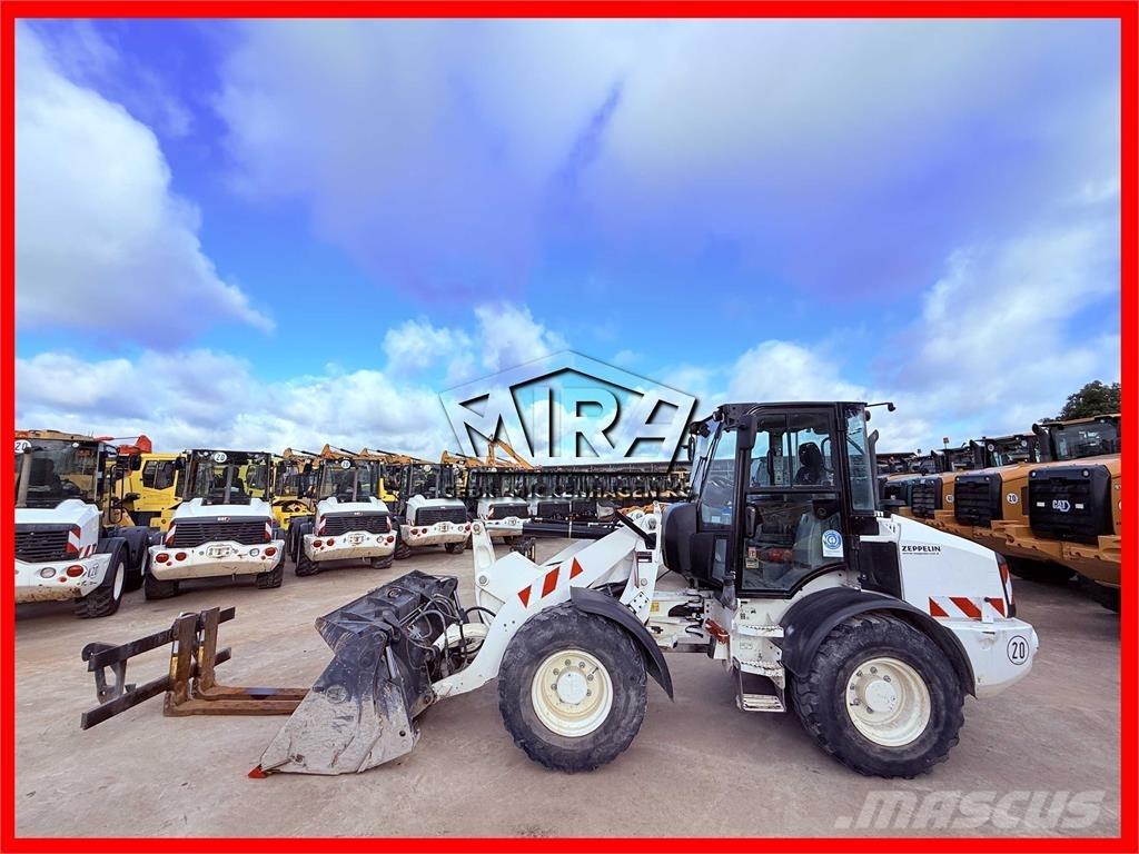 CAT 908M Iekrāvēji uz riteņiem