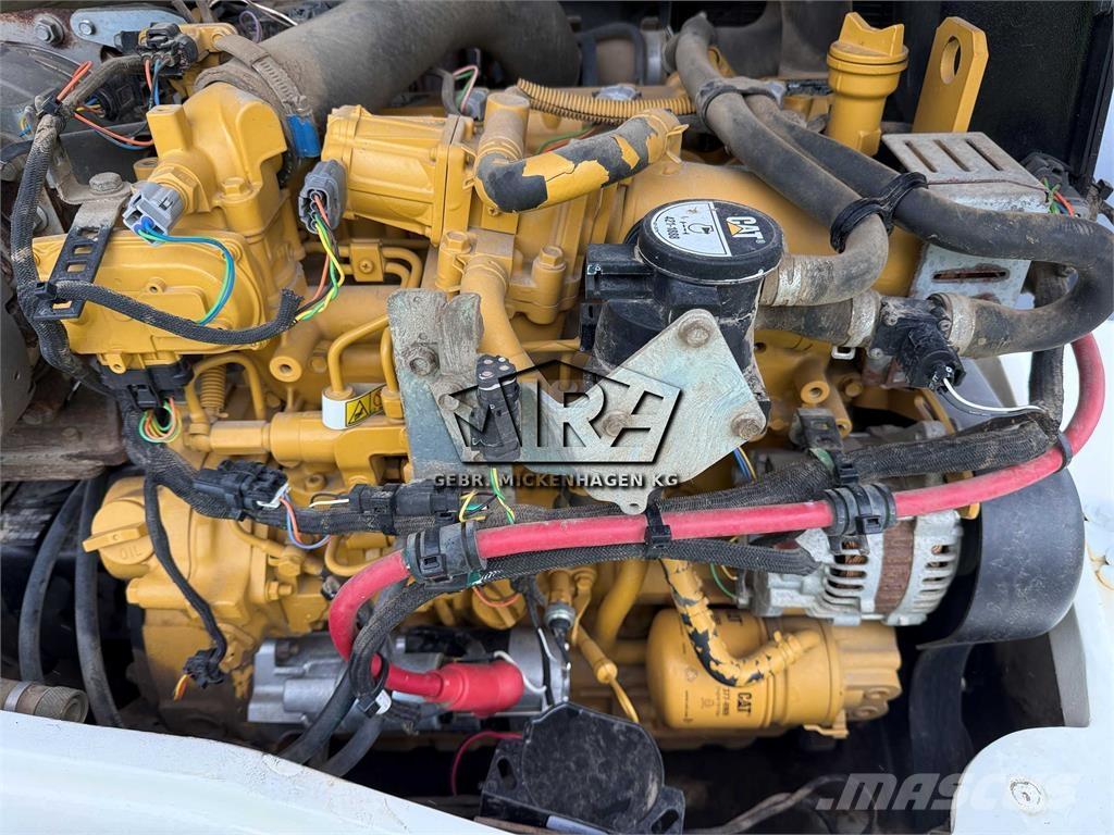 CAT 908M Iekrāvēji uz riteņiem