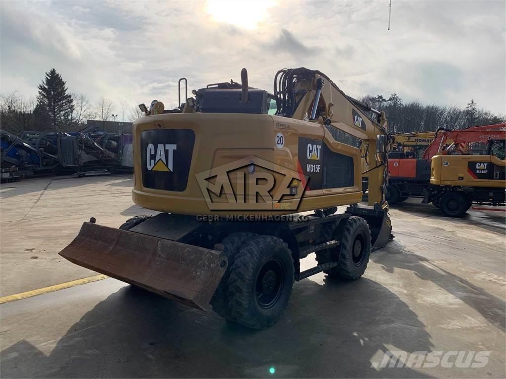CAT M 315 F Ekskavatori uz riteņiem