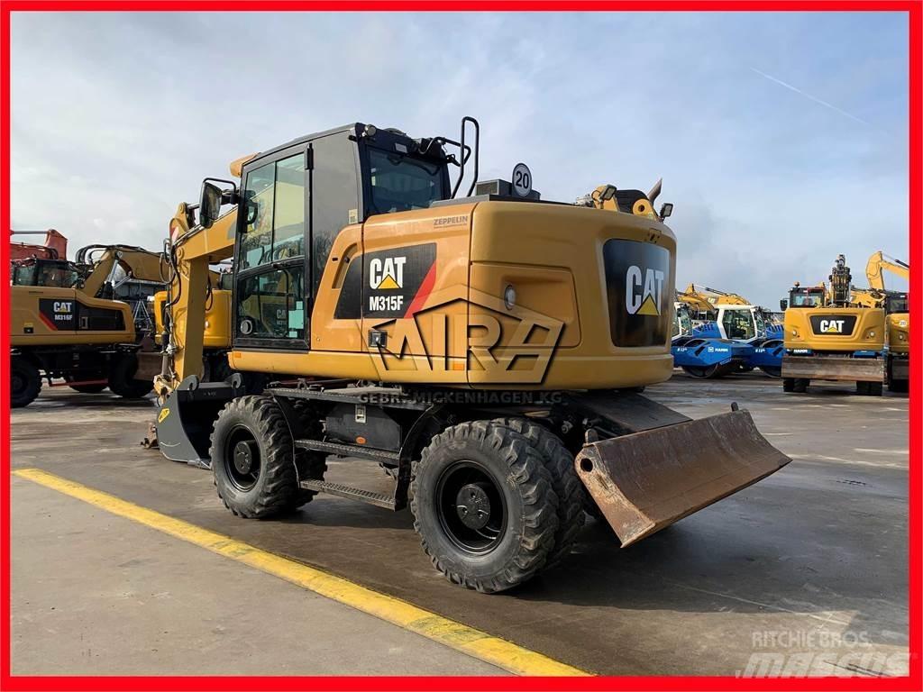 CAT M315 F Ekskavatori uz riteņiem