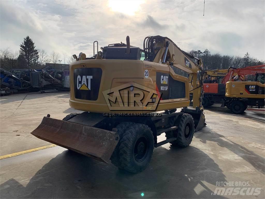 CAT M315 F Ekskavatori uz riteņiem