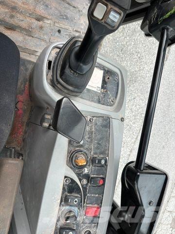 CAT 906H Ekskavatori uz riteņiem