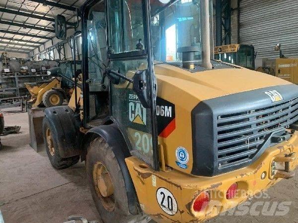 CAT 906M Iekrāvēji uz riteņiem