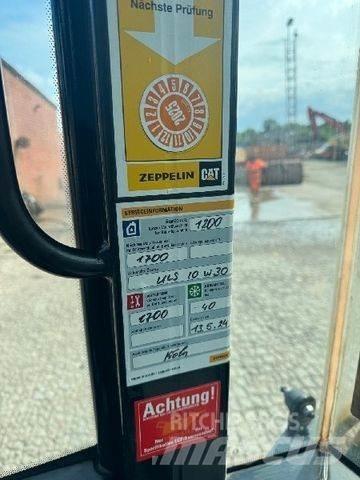 CAT 906M Iekrāvēji uz riteņiem