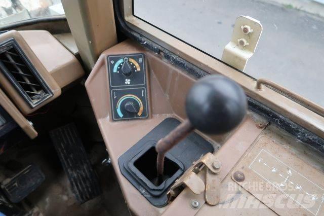 CAT 910 E Iekrāvēji uz riteņiem