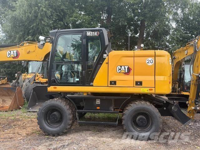 CAT M 314 NEU Ekskavatori uz riteņiem