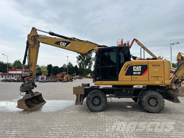 CAT M318F Būvniecība- Citi