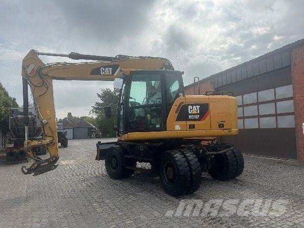 CAT M318F Ekskavatori uz riteņiem