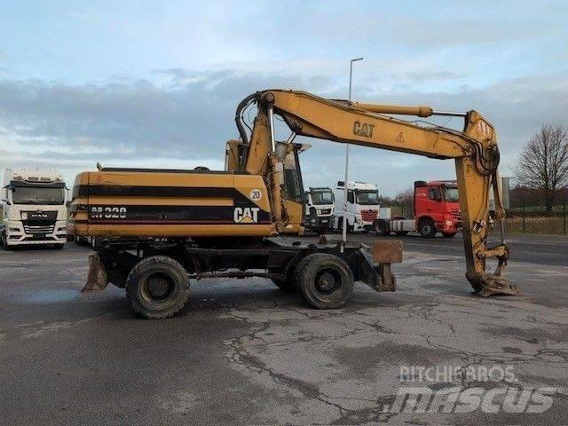 CAT M320 Ekskavatori uz riteņiem
