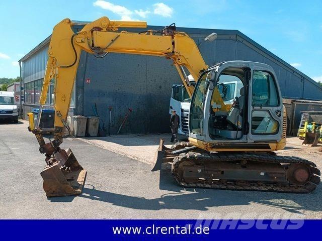 New Holland E70SR 4 Ekskavatori-iekrāvēji