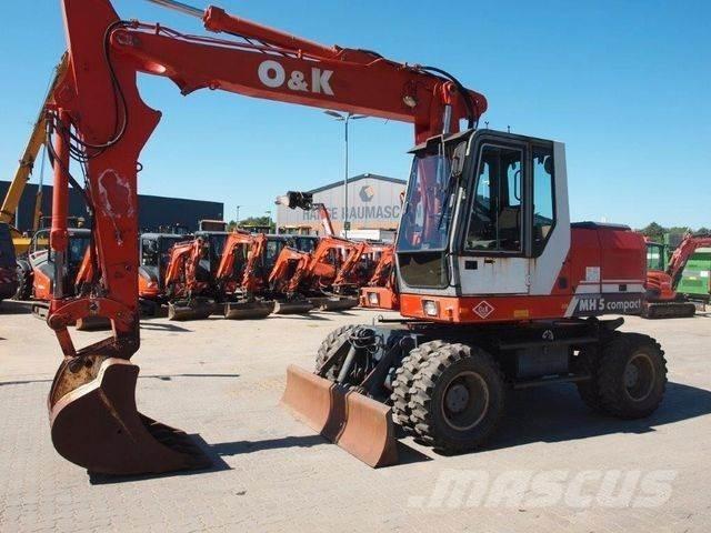 O&K MH 5 Compakt Ekskavatori uz riteņiem