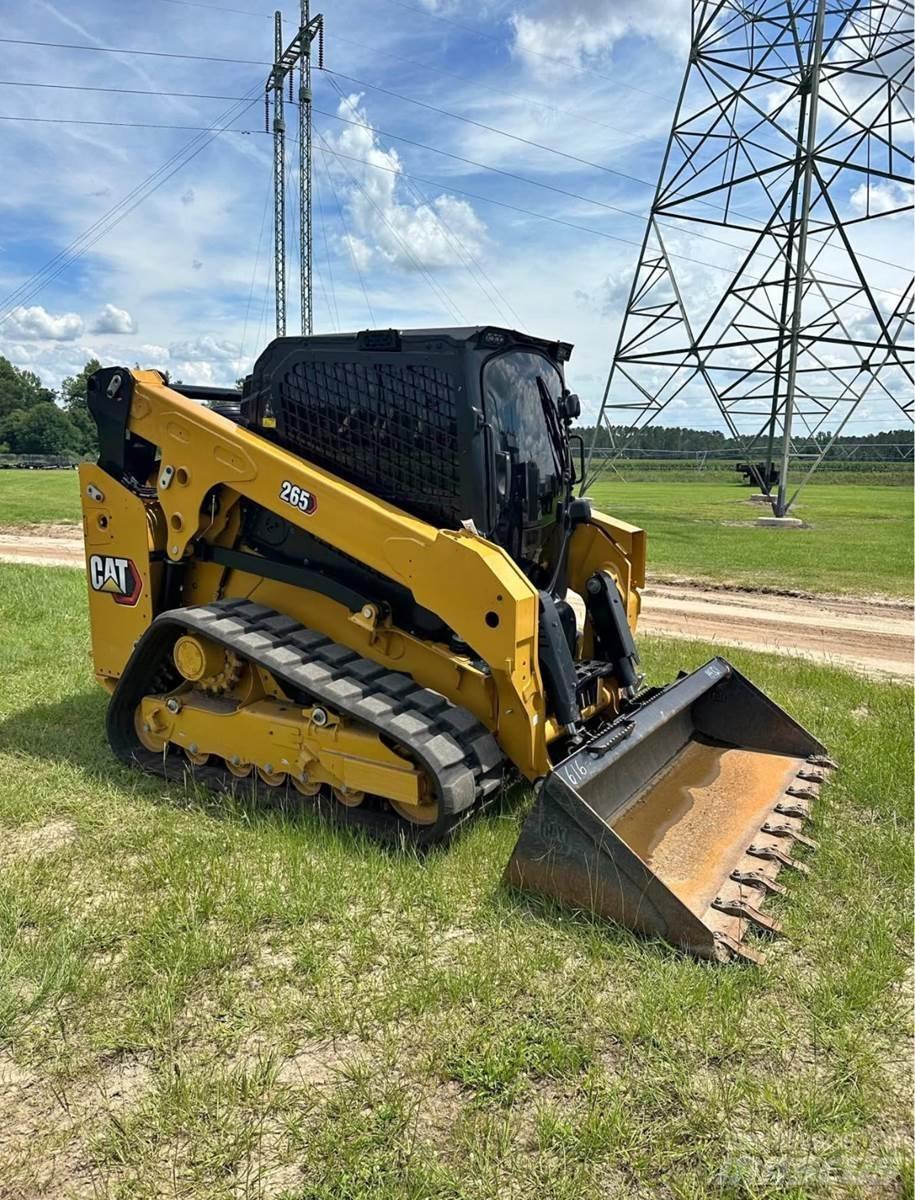 CAT 265 Lietoti riteņu kompaktiekrāvēji