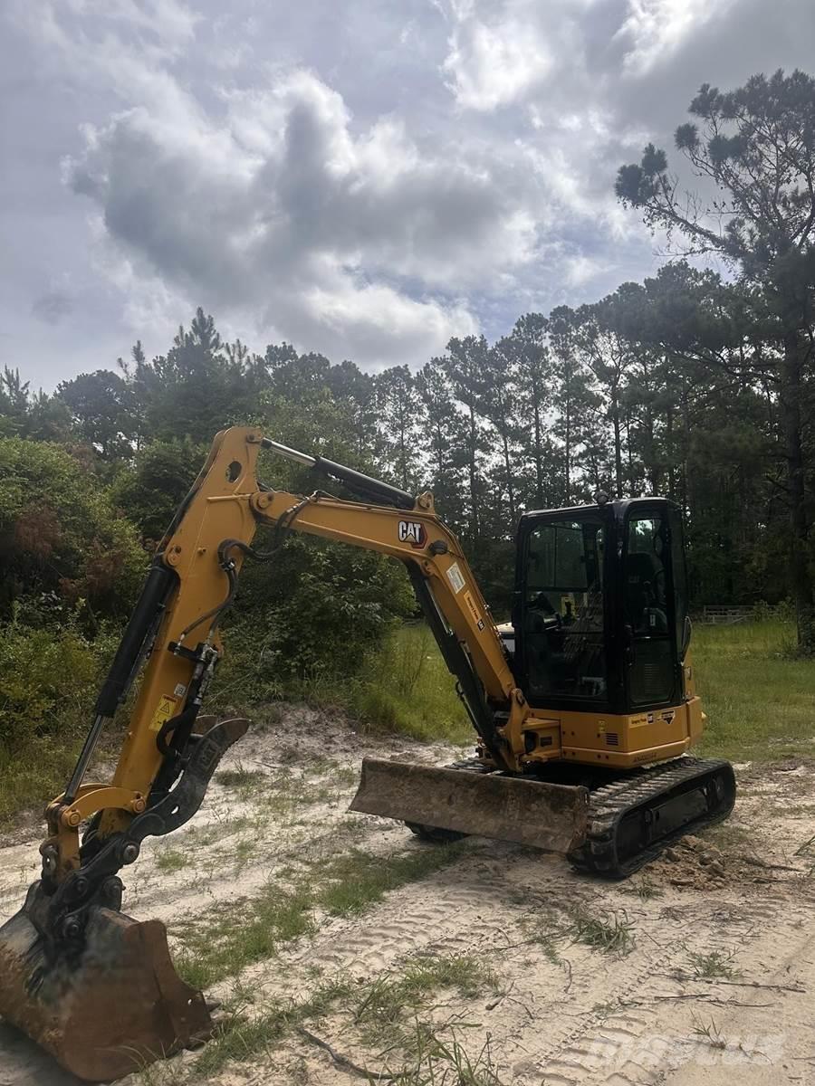 CAT 304 Mini ekskavatori < 7 t