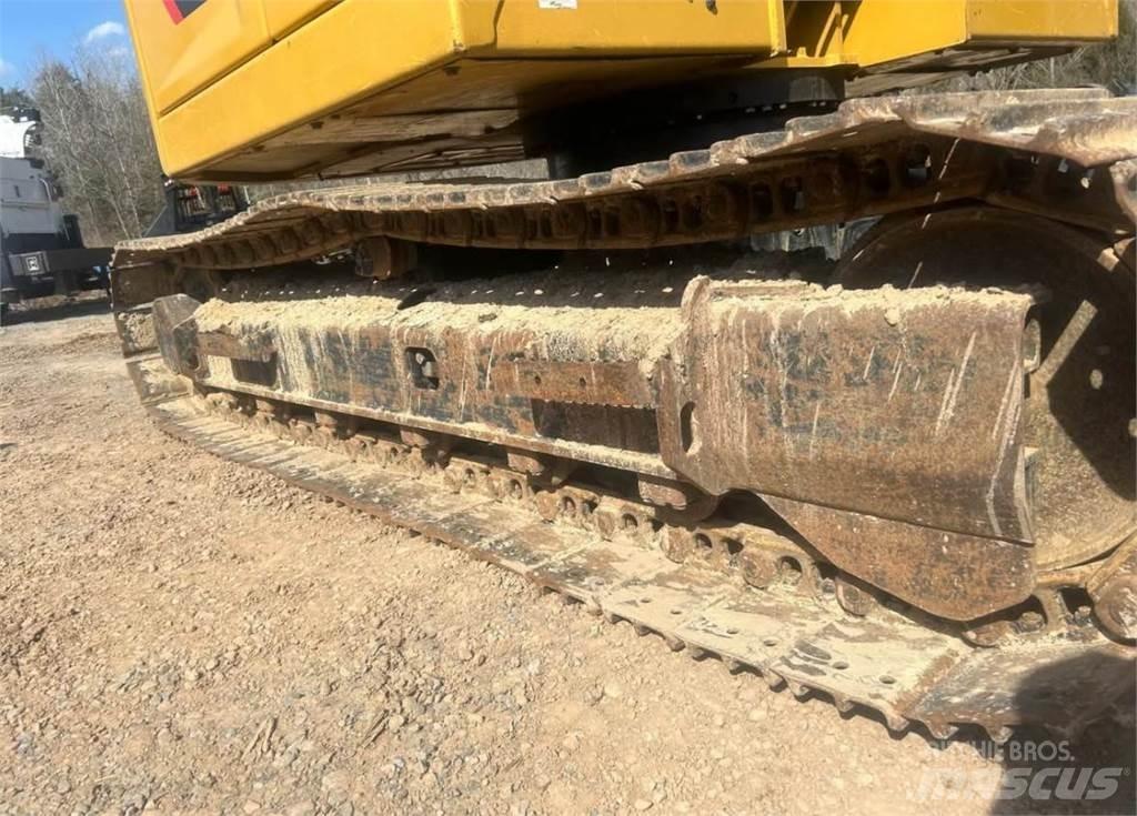 CAT 310 Mini ekskavatori < 7 t
