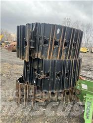 CAT 325 Sliedes, ķēdes un šasija