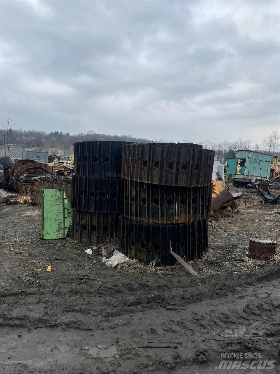 CAT 325 Sliedes, ķēdes un šasija