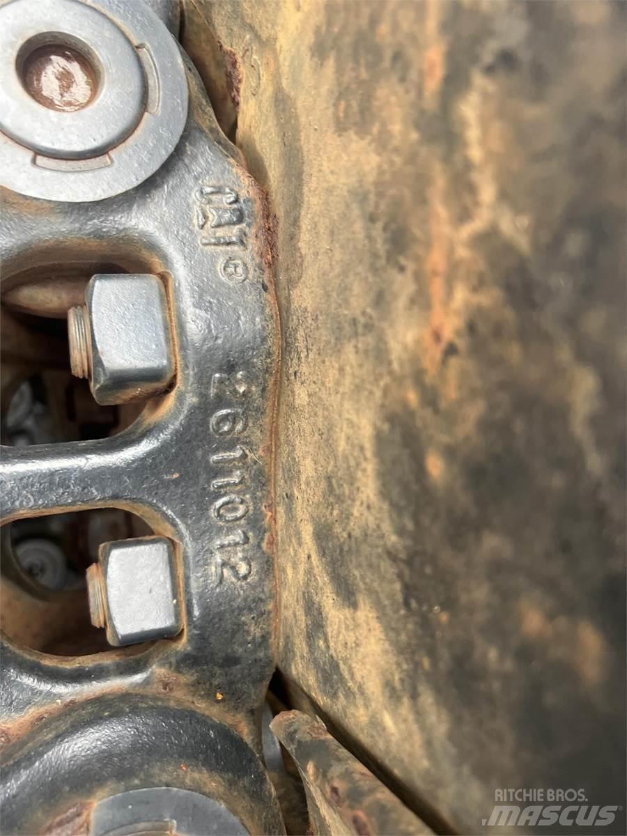 CAT 325 Sliedes, ķēdes un šasija