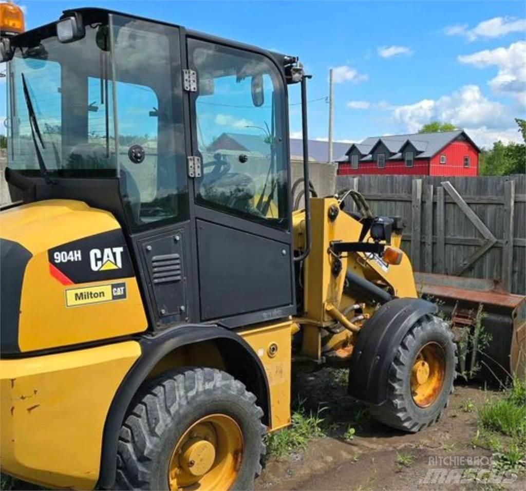 CAT 904H Iekrāvēji uz riteņiem
