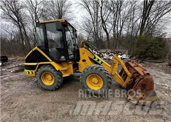 CAT 906 Iekrāvēji uz riteņiem