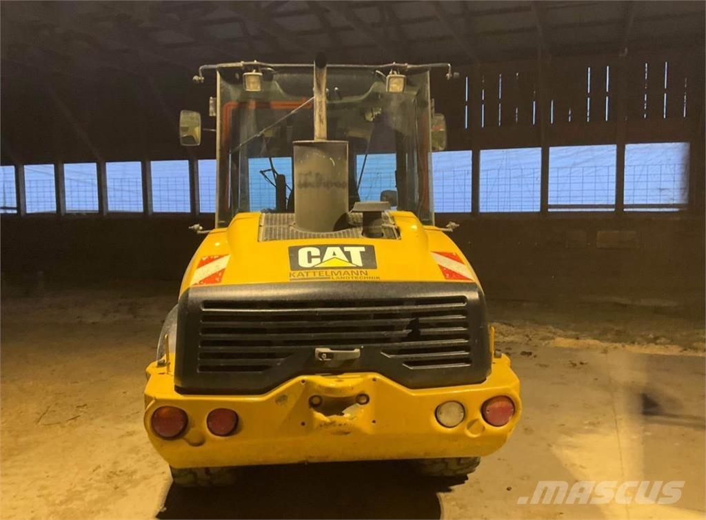 CAT 906H Iekrāvēji uz riteņiem