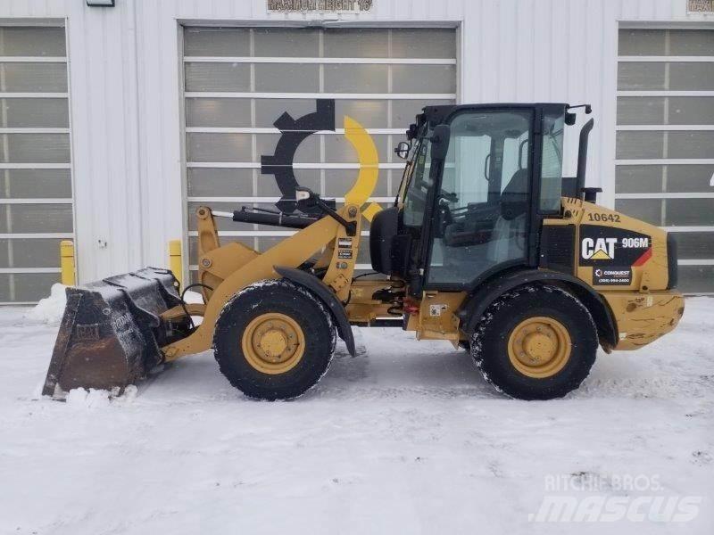 CAT 906M Iekrāvēji uz riteņiem