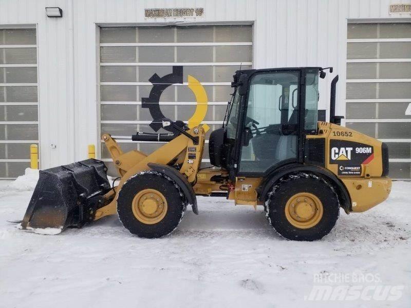 CAT 906M Iekrāvēji uz riteņiem