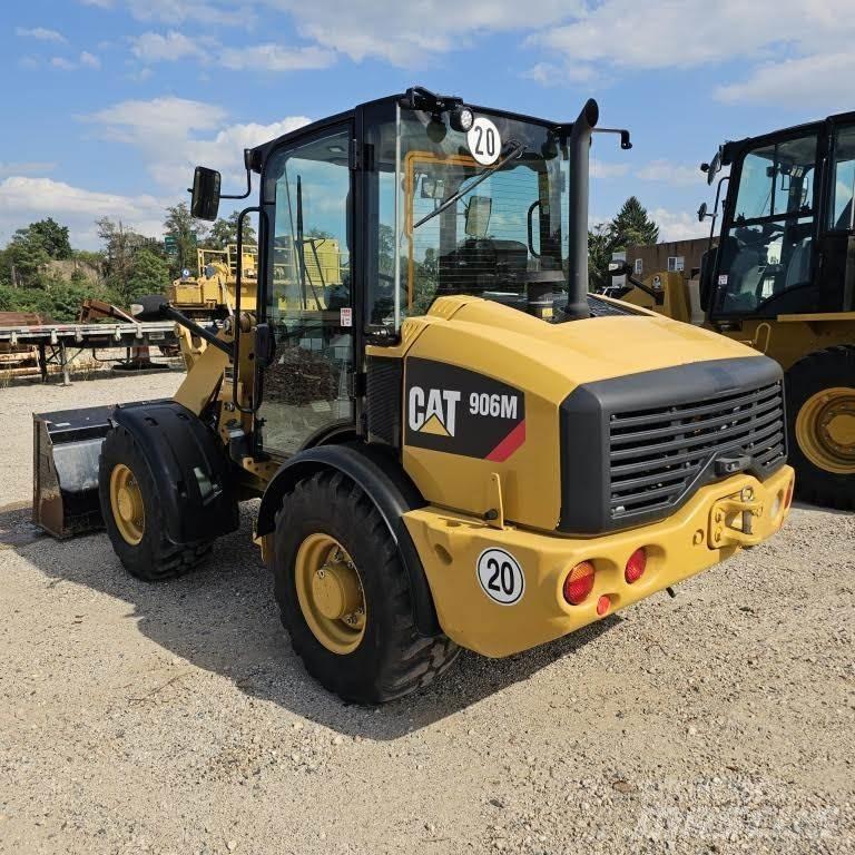 CAT 906M Iekrāvēji uz riteņiem