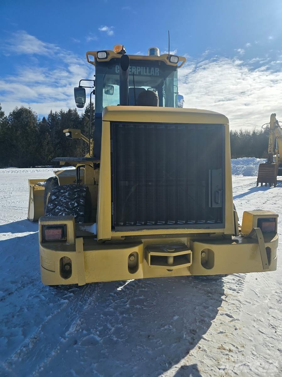 CAT 938H Iekrāvēji uz riteņiem