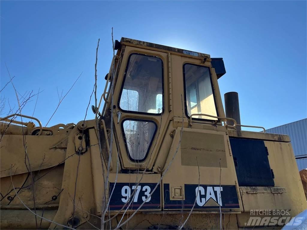 CAT 973 Kāpurķēžu iekrāvēji