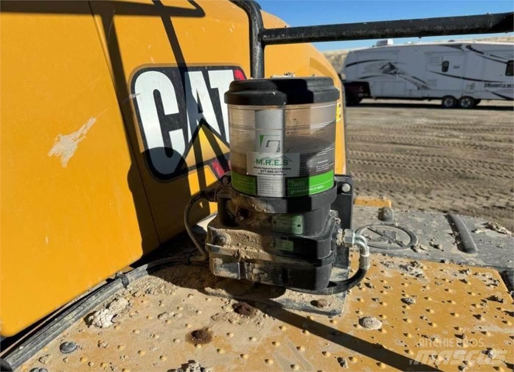 CAT 980 Iekrāvēji uz riteņiem