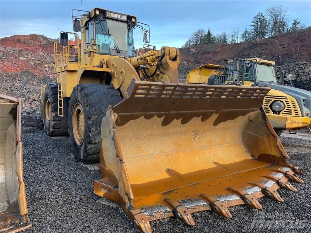 CAT 990 Iekrāvēji uz riteņiem