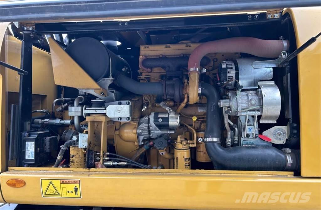 CAT M313D Ekskavatori uz riteņiem