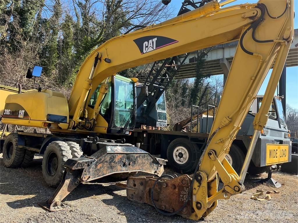 CAT M318C Ekskavatori uz riteņiem