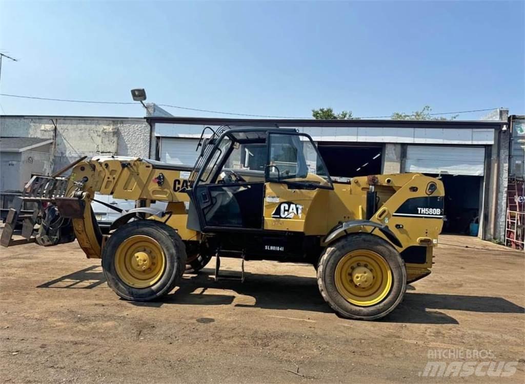 CAT TH580B Teleskopiskie manipulatori
