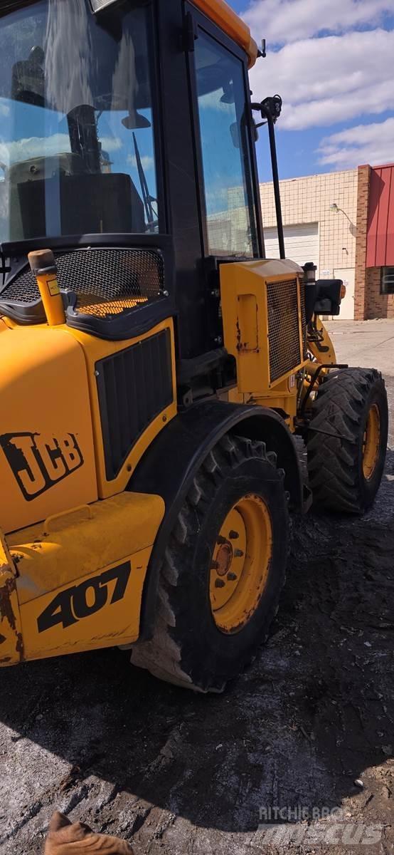 JCB 407 Iekrāvēji uz riteņiem