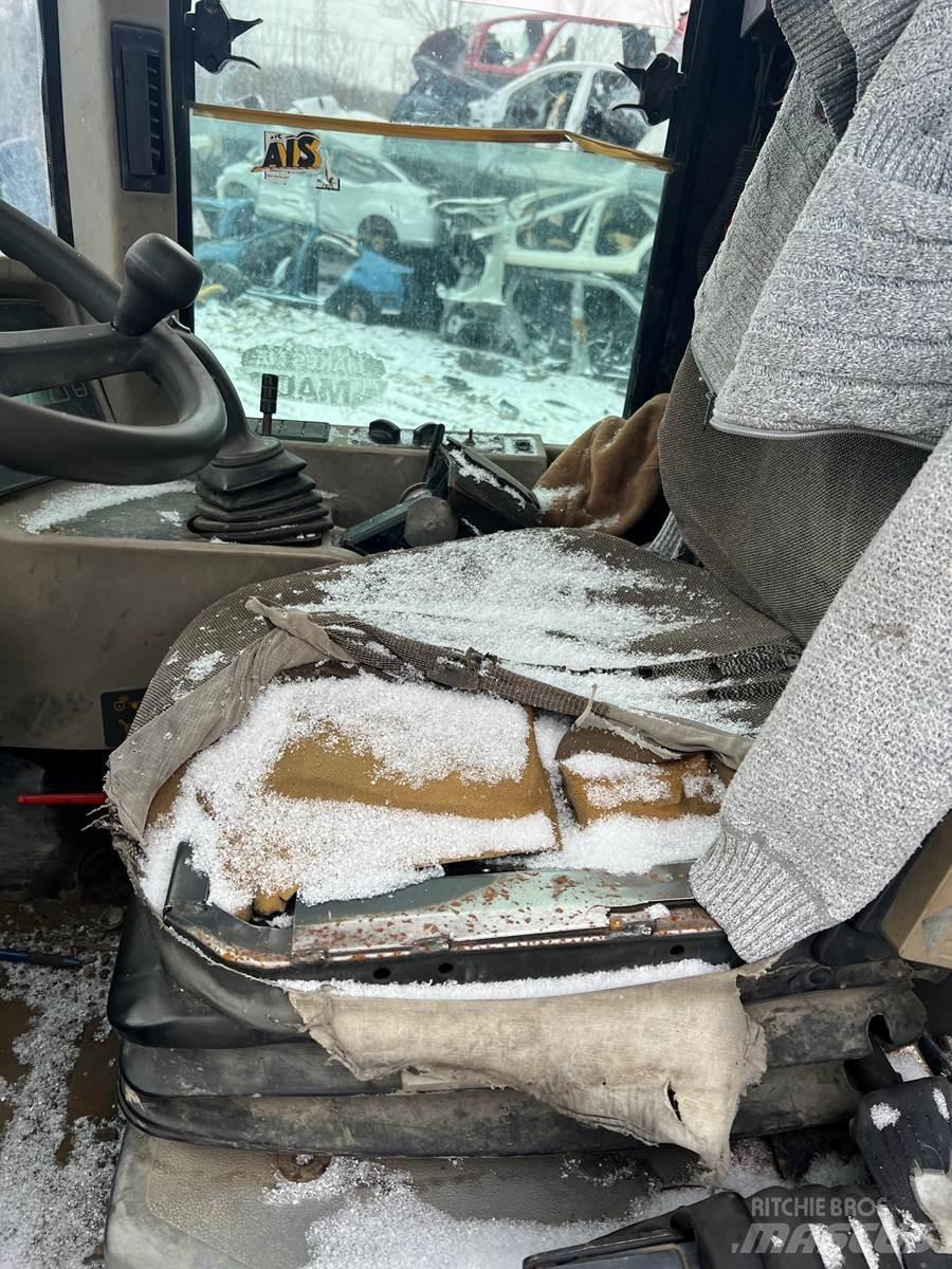 JCB 411 HT Iekrāvēji uz riteņiem