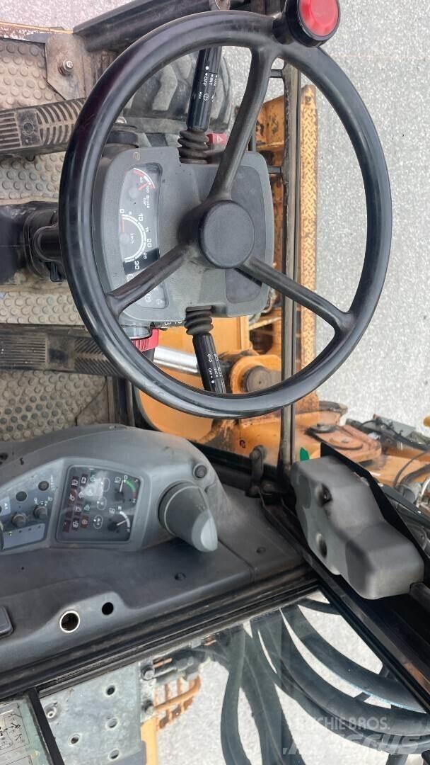CASE WX90 Ekskavatori uz riteņiem
