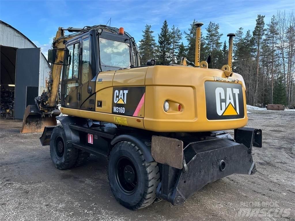 CAT M 316 D Ekskavatori uz riteņiem