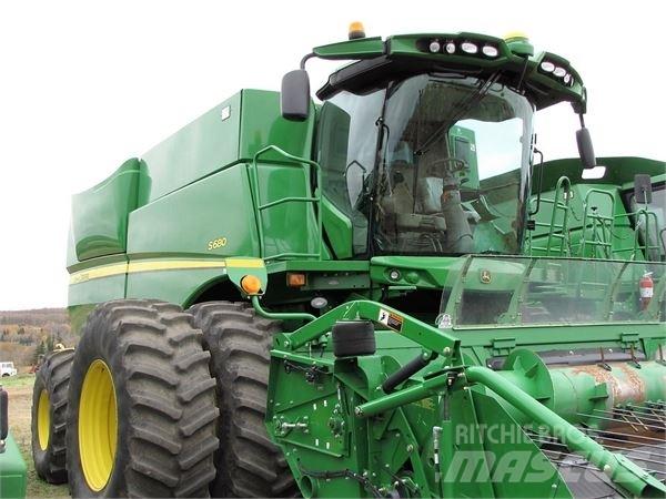 John Deere S680 Ražas novākšanas kombaini