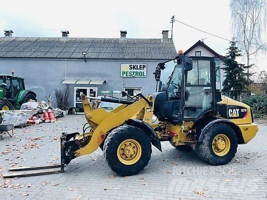 CAT 907H Iekrāvēji uz riteņiem