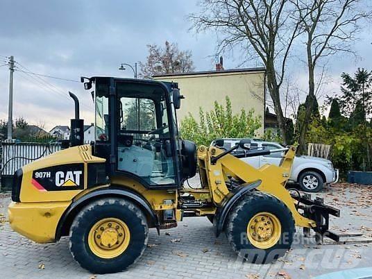 CAT 907H Iekrāvēji uz riteņiem